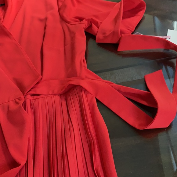 Alex Marie
Arielle Short Sleeve V-Neck Tie Front Romper Dress. - Picture 10 of 12